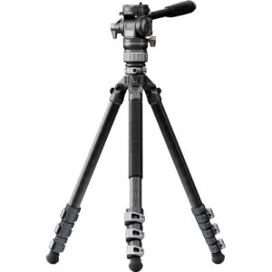 A front view of a black Tilta carbon fiber travel tripod fully extended, showing its three legs and center column mounted with a fluid video head.