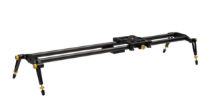 A studio shot of the black Ikan SLD-31 carbon fiber camera slider, showcasing its rectangular mounting platform, dual track rails, and adjustable rubberized leveling feet on both ends.