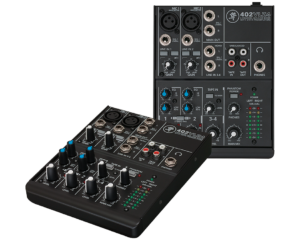 A top-down, close-up shot of a black Mackie 402VLZ4 4-channel ultra-compact audio mixer showing its control knobs, level meters, and input jacks.