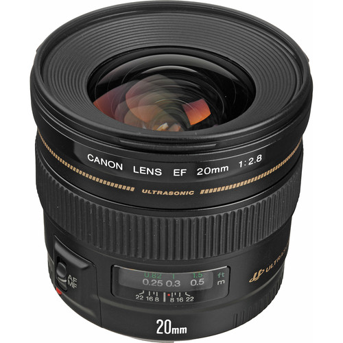Front view of a Canon EF 20mm f/2.8 wide-angle lens showing its glass elements, distance scale window, and front lens markings.